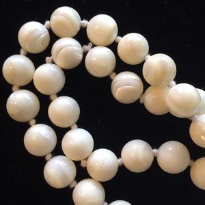 Necklace. Knotted strand of Shell beads.